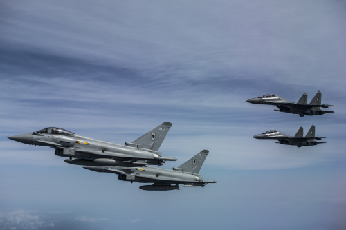Air to Air imagery of Royal Air Force Typhoons and Indian Air Force Flankers taken from the Voyager Aircraft during a refuelling mission