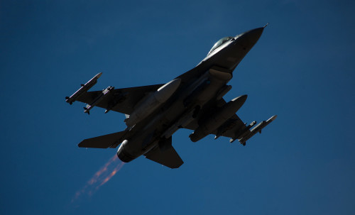 An F-16 Fighting Falcon takes off at Nellis Air Force Base, Nev., Jan. 25, 2016, during Red Flag 16-1. Red Flag involves a variety of attack, fighter, bomber, reconnaissance, electronic warfare, airlift, support, and search and rescue aircraft.