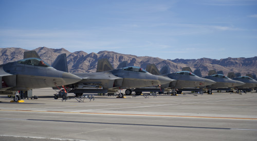 Five F-22 Raptors from Tyndall AFB, Fla., sit on the flightline during the first day of Red Flag 16-1, Jan. 25, at Nellis AFB, Nev. Red Flag is a joint, full-spectrum, readiness exercise designed to provide the most realistic combat training available.