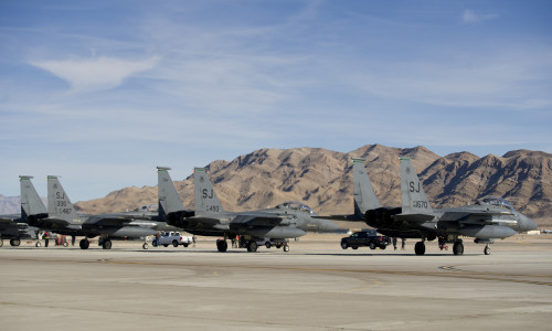 Three F-15E Strike Eagles from Seymour Johnson Air Force Base, N.C., sit on the flightline before takeoff during the first day of Red Flag 16-1, Jan. 25 at Nellis AFB Nev. More than 130 aircraft and 3,000 personnel from more than 30 units including squadrons from Australia and the United Kingdom have arrived at Nellis to participate in the most realistic combat training available.