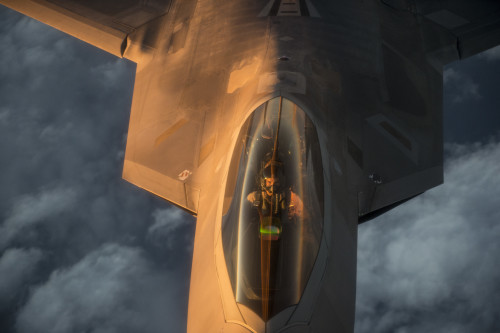 A U.S. Air Force F-22 Raptor flies over the Arabian Sea in support of Operation Inherent Resolve, Jan. 27, 2016. OIR is the coalition intervention against the Islamic State of Iraq and the Levant. (U.S. Air Force photo by Staff Sgt. Corey Hook/Released)