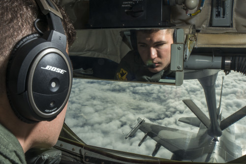 U.S. Air Force Airman 1st Class Ryan Hortman, 909th Air Refueling Squadron boom operator, refuels an 18th Aggressor Squadron F-16 Fighting Falcon during Forceful Tiger, Jan. 28, 2016, near Okinawa, Japan. The KC-135 has provided the ability to project forces anywhere in the world since it first entered the service in 1957. (U.S. Air Force photo by Staff Sgt. Maeson L. Elleman)