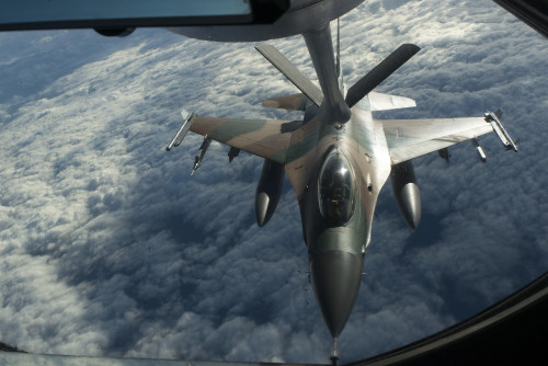 A U.S. Air Force F-16 Fighting Falcon from the 18th Aggressor Squadron refuels from a KC-135 Stratotanker during Forceful Tiger, Jan. 28, 2016, near Okinawa, Japan. The 18th AGRS, stationed at Eielson Air Force Base, Alaska, recently deployed to Kadena Air Base, Japan, for joint and bilateral training to bolster mission readiness in the Indo-Asia-Pacific region. (U.S. Air Force photo by Staff Sgt. Maeson L. Elleman)