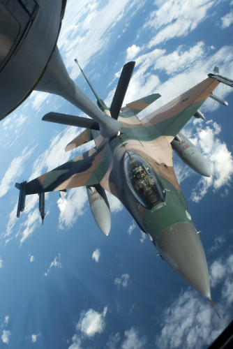 A U.S. Air Force F-16 Fighting Falcon from the 18th Aggressor Squadron refuels from a KC-135 Stratotanker during Forceful Tiger, Jan. 28, 2016, near Okinawa, Japan. The F-16 is a compact, multi-role fighter aircraft designed to provide air-to-air combat and air-to-surface attack capabilities as a relatively low-cost, high-performance weapon system for the U.S. and allied nations. (U.S. Air Force photo by Staff Sgt. Maeson L. Elleman)