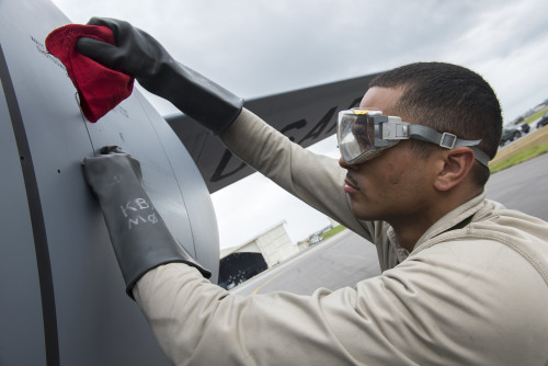 U.S. Air Force Senior Airman Michael Lawrence, 909th Aircraft Maintenance Unit crew chief, performs engine oil checks on a KC-135 Stratotanker following its flight in support of Forceful Tiger, Jan. 28, 2016, at Kadena Air Base, Japan. Air Force maintainers are the backbone for providing the force with highly capable aircraft capable of supporting and defending allies all around the globe. Without the diligence of the 909th AMU, the quickly aging aircraft would be unable to support the mission in the Indo-Asia-Pacific. (U.S. Air Force photo by Staff Sgt. Maeson L. Elleman)