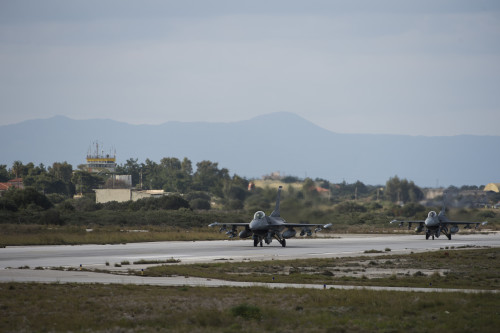 U.S. Air Force pilots from the 480th Expeditionary Fighter Squadron taxi F-16 Fighting Falcon fighter aircraft during a flying training deployment on the flightline at Souda Bay, Greece, Jan. 27, 2016. Approximately 300 personnel and 18 F-16s from the 52nd Fighter Wing at Spangdahlem Air Base, Germany, will support the FTD as part of U.S. Air Forces in Europe-Air Forces Africa's Forward Ready Now stance. (U.S. Air Force photo by Staff Sgt. Christopher Ruano/Released)