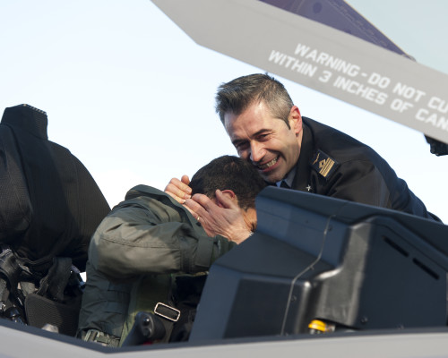 160205-O-ZZ999-930 NAS Patuxent River (February 5, 2016) The F-35 Lightning II Joint Program Office Italian Assistant National Deputy congratulates Italian F-35 pilot Major Gian Marco D. for making aviation history by piloting an Italian Air Force (Aeronautica Militare) F-35A Lightning II aircraft on the very first trans-Atlantic Ocean crossing of an F-35 aircraft Feb. 5. The F-35 aircraft — known as AL-1 — arrived at Naval Air Station Patuxent River, Md., from Cameri Air Base, Italy, at 2:24 p.m. EST following an 11-hour oceanic flight. (U.S. Navy photo courtesy Andy Wolfe/Released)