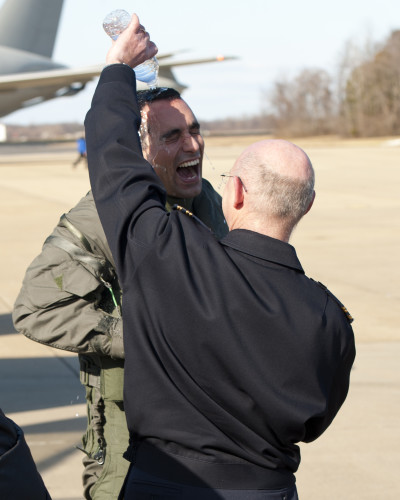 160205-O-ZZ999-938 NAS Patuxent River (February 5, 2016) Italian F-35 Lightning II pilot, Major Gian Marco D., is congratulated for making aviation history by piloting an Italian Air Force (Aeronautica Militare) F-35A Lightning II aircraft on the very first trans-Atlantic Ocean crossing of an F-35 aircraft February 5. The F-35 aircraft — known as AL-1 — arrived at Naval Air Station Patuxent River, Md., from Cameri Air Base, Italy, at 2:24 p.m. EST following an 11-hour oceanic flight. (U.S. Navy photo courtesy Andy Wolfe/Released)