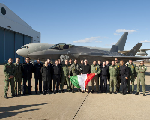 160205-O-ZZ999-963 NAS Patuxent River (February 5, 2016) Italian Air Force (Aeronautica Militare) personnel celebrate after an F-35A Lightning II aircraft made aviation history by completing the very first F-35 trans-Atlantic Ocean crossing, arriving at Naval Air Station Patuxent River, Maryland from Cameri Air Base, Italy, on February 5 at 2:24 p.m. EST. F-35A aircraft AL-1, the first international jet fully built overseas at the Cameri Final Assembly & Check-Out (FACO) facility at Cameri Air Base, Italy, is also the first F-35 assembled outside of the U.S. to land on U.S. soil.  (U.S. Navy photo courtesy Andy Wolfe/Released)