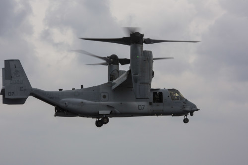 An MV-22B Osprey with Marine Medium Tiltrotor Squadron 265 (Reinforced), 31st Marine Expeditionary Unit, flies over the USS Bonhomme Richard (LHD 6) Feb. 6, 2016. The Marines of VMM-265 (Rein.), 31st MEU, were conducting deck landing qualifications with the various aircraft of the 31st MEU's aviation combat element. The 31st MEU is currently embarked on the ships of the Bonhomme Richard Amphibious Ready Group on their spring deployment to the Asia-Pacific region. (U.S. Marine Corps photo by Gunnery Sgt. Zachary Dyer)