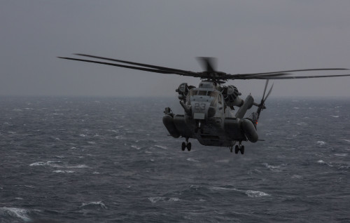 A CH-53E Super Stallion with Marine Medium Tiltrotor Squadron 265 (Reinforced), 31st Marine Expeditionary Unit, comes in to land on the flight deck of the USS Bonhomme Richard (LHD 6) Feb. 6, 2016. The Marines of VMM-265 (Rein.), 31st MEU, were conducting deck landing qualifications with the various aircraft of the 31st MEU's aviation combat element. The 31st MEU is currently embarked on the ships of the Bonhomme Richard Amphibious Ready Group on their spring deployment to the Asia-Pacific region. (U.S. Marine Corps photo by Gunnery Sgt. Zachary Dyer)
