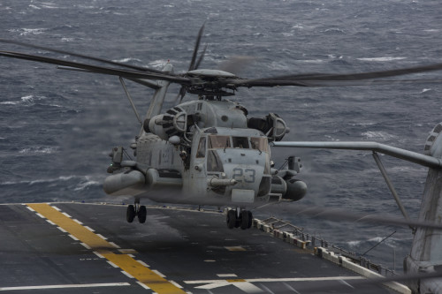A CH-53E Super Stallion with Marine Medium Tiltrotor Squadron 265 (Reinforced), 31st Marine Expeditionary Unit, takes off from the flight deck of the USS Bonhomme Richard (LHD 6) Feb. 6, 2016. The Marines of VMM-265 (Rein.), 31st MEU, were conducting deck landing qualifications with the various aircraft of the 31st MEU's aviation combat element. The 31st MEU is currently embarked on the ships of the Bonhomme Richard Amphibious Ready Group on their spring deployment to the Asia-Pacific region. (U.S. Marine Corps photo by Gunnery Sgt. Zachary Dyer)