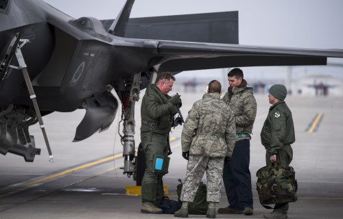 Crew chiefs from the 53rd Test and Evaluations Group greet aircrew after the first three F-35A Lightning IIs arrive at Mountain Home Air Force Base, Idaho, Feb. 8, 2016. The 53rd TEG will conduct various training scenarios out of Mountain Home AFB to assess deployment capability of the F-35A. (U.S. Air Force photo by Senior Airman Jeremy L. Mosier/Released)
