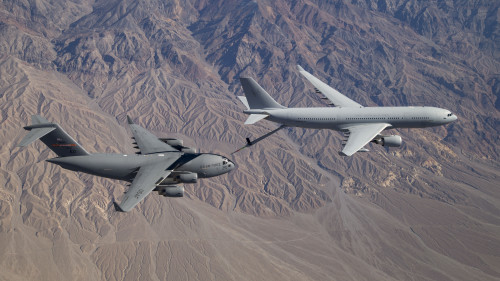 A Royal Australian Air Force (RAAF) KC-30A Multi-Role Tanker Transport (MRTT) refuels a United States Air Force C-17A Globemaster III transport. *** Local Caption *** On 10 February 2016, a RAAF KC-30A Multi-Role Tanker Transport (MRTT) conducted its first air-to-air refuelling with a C-17A Globemaster III transport, flying from Edwards Air Force Base in California. The five-hour sortie saw 39 contacts between the KC-30A and C-17A aircraft, with approximately 6,800 kilograms of fuel transferred to the C-17A via the KC-30As Advanced Refuelling Boom System (ARBS). The trial is part of a series of flights being made by a KC-30A with a range of USAF aircraft, and is a precursor to refuelling the RAAF's own C-17As in the near future.