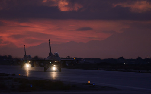 U.S. Air Force pilots from the 480th Expeditionary Fighter Squadron taxi F-16 Fighting Falcon fighter aircraft during a flying training deployment on the flightline at Souda Bay, Greece, Jan. 28, 2016. This training represents the fourth of its kind between the U.S. and Greek air forces since January 2014.  (U.S. Air Force photo by Staff Sgt. Christopher Ruano/Released)