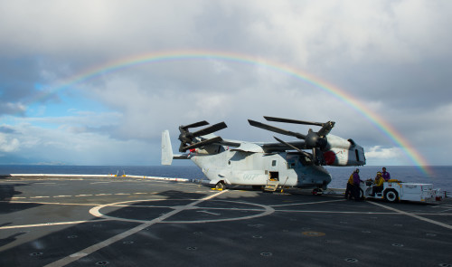 160219-N-GR718-063 PACIFIC OCEAN (Feb. 19, 2016) Sailors aboard amphibious transport dock ship USS New Orleans (LPD 18) prepare to move an MV-22 Osprey on the flight deck. More than 4,500 Sailors and Marines from Boxer Amphibious Ready Group and embarked 13th Marine Expeditionary Unit (13th MEU) are transiting the Pacific Ocean to the 5th and 7th Fleet area of operations. (U.S. Navy Photo by Mass Communication Specialist 3rd Class Chelsea D. Daily/Released)