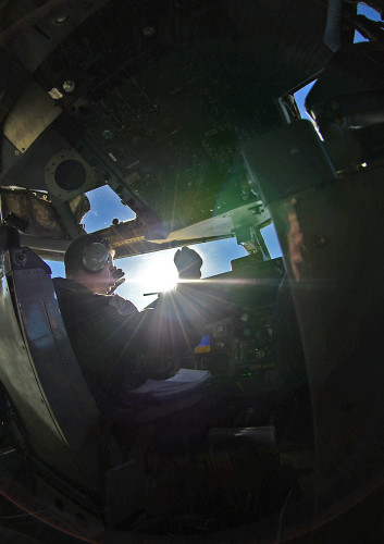 U.S. Air Force Capt. Scott Carlan, 351st Expeditionary Air Refueling Squadron KC-135 Stratotanker pilot, flies in support of Operation Juniper Micron, Feb. 26, 2016. Three KC-135 Stratotankers, along with 50 Airmen from the 100th Air Refueling Wing, are providing air refueling and airlift support to French operations in Mali and North Africa in support of OJM. (U.S. Air Force photo by Senior Airman Erin Trower/Released)