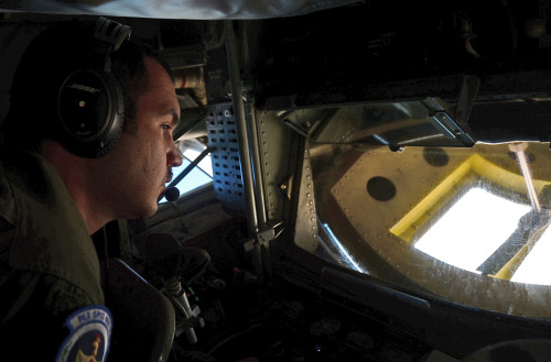 U.S. Air Force Senior Airman Bryan Flory, 351st Expeditionary Air Refueling Squadron boom operator, prepares for a refueling mission in support of Operation Juniper Micron over North Africa, Feb. 26, 2016. Airmen arrived at Istres-Le Tubé Air Base, France, the previous week to continue to provide air refueling and airlift support of French operations in Mali and North Africa in support of OJM. (U.S. Air Force photo by Senior Airman Erin Trower/Released)
