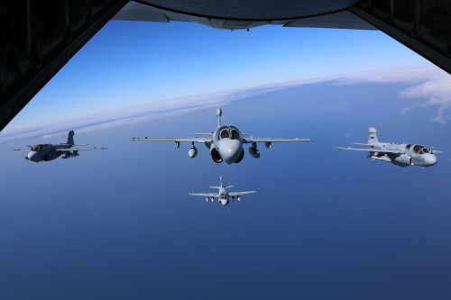 Four EA-6B Prowlers belonging to each Prowler squadron aboard Marine Corps Air Station Cherry Point conducted a "Final Four" division flight aboard the air station March 1, 2016. The "Final Four" flight is the last time the Prowler squadrons will be flying together before the official retirement of Marine Tactical Electronic Warfare Training Squadron 1 at the end of Fiscal Year 16 and the eventual transition to "MAGTF EW". MAGTF EW is a more distributed strategy where every platform contributes to the EW mission, enabling relevant tactical information to move throughout the electromagnetic spectrum and across the battlefield faster than ever before.(U.S Marine Corps Photo by Cpl. N.W. Huertas/Released)