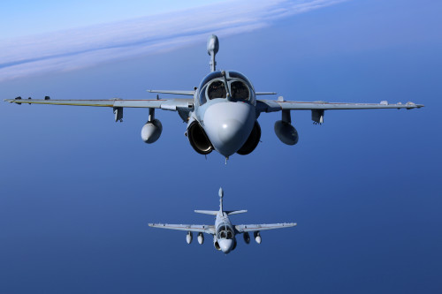 Two EA-6B Prowlers belonging to each Prowler squadron aboard Marine Corps Air Station Cherry Point conducted a "Final Four" division flight aboard the air station March 1, 2016. The "Final Four" flight is the last time the Prowler squadrons will be flying together before the official retirement of Marine Tactical Electronic Warfare Training Squadron 1 at the end of Fiscal Year 16 and the eventual transition to "MAGTF EW". MAGTF EW is a more distributed strategy where every platform contributes to the EW mission, enabling relevant tactical information to move throughout the electromagnetic spectrum and across the battlefield faster than ever before. (U.S. Marine Corps photo by Cpl. N.W. Huertas/Released)