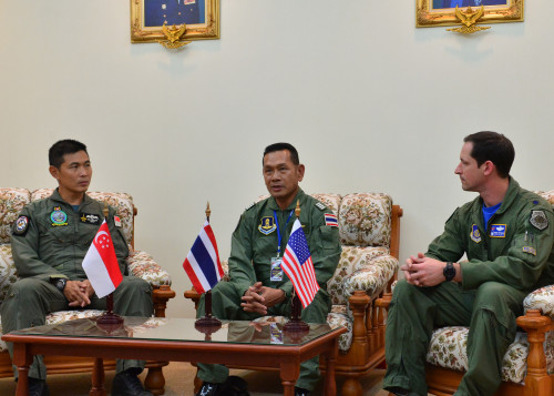 Col. Sim Pengshin, exercise director from the Republic of Singapore Air Force, Group Captain Manoon Rukitna, exercise director for the Royal Thailand Air Force, and Lt. Col. Jack Arthaud, exercise director for the U.S. Air Force, talk to local media during Exercise Cope Tiger 16, on Korat Royal Thai Air Force Base, Thailand, March 11, 2016. Exercise Cope Tiger is multilateral field training exercise, involving over 1,200 personnel from the U.S., Thailand and Singapore. The purpose of this exercise is to improve readiness and interoperability between three countries and continue the growth of strong relationships within the Asia-Pacific Region. (U.S. Air Force Photo by Tech Sgt. Aaron Oelrich/Released)