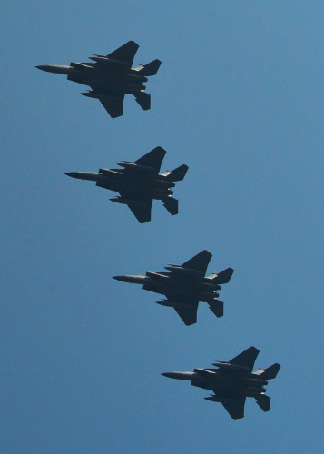 U.S. Air Force F-15 Eagles fly in formation before they land during Exercise Cope Tiger 16, on Korat Royal Thai Air Force Base, Thailand, March 11, 2016. Exercise Cope Tiger 16 includes over 1,200 personnel from three countries and continues the growth of strong, interoperable and beneficial relationships within the Asia-Pacific Region, while demonstrating U.S. capability to project forces strategically in a combined, joint environment. (U.S. Air Force Photo by Tech Sgt. Aaron Oelrich/Released)