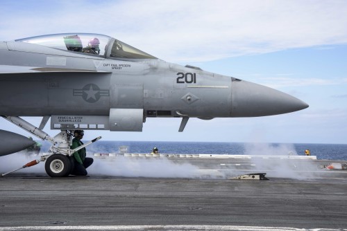 160320-N-KK394-045 ATLANTIC OCEAN (March 20, 2016) - Capt. Paul C. Spedero Jr., commanding officer of the aircraft carrier USS Dwight D. Eisenhower (CVN 69), the flagship of the Eisenhower Carrier Strike Group, pilots an F/A-18E Super Hornet assigned to the Sidewinders of Strike Fighter Squadron (VFA) 86 as it undergoes pre-flight checks on the ship’s flight deck. Ike is underway conducting a Composite Training Unit Exercise (COMPTUEX) with the Eisenhower Carrier Strike Group in preparation for a future deployment. (U.S. Navy photo by Mass Communication Specialist 3rd Class Anderson W. Branch/Released)