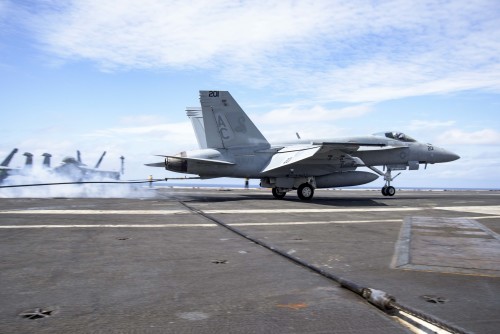 160320-N-KK394-118 ATLANTIC OCEAN (March 20, 2016) - Capt. Paul C. Spedero Jr., commanding officer of the aircraft carrier USS Dwight D. Eisenhower (CVN 69), the flagship of the Eisenhower Carrier Strike Group, pilots an F/A-18E Super Hornet assigned to the Sidewinders of Strike Fighter Squadron (VFA) 86 as it lands on the ship’s flight deck. Ike is underway conducting a Composite Training Unit Exercise (COMPTUEX) with the Eisenhower Carrier Strike Group in preparation for a future deployment. (U.S. Navy photo by Mass Communication Specialist 3rd Class Anderson W. Branch/Released)