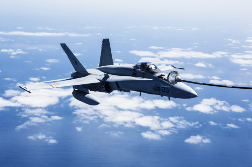 A Spanish Air Force F/A-18 Hornet with 462 Squadron receives fuel from a U.S. Marine Corps KC-130J with Marine Aerial Refueler Transport Squadron 252, Special-Purpose Marine Air-Ground Task Force-Crisis Response- Africa during an aerial refuel mission, Gran Canaria, Spain, Mar. 29, 2016. SPMAGTF-CR-AF Marines and Spanish airmen conducted air-to-air refueling missions in order to enhance crisis response readiness and help build relationships between the two militaries. (U.S. Marine Corps photo by Sgt. Kassie L. McDole/Released)