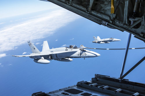Spanish Air Force F/A-18 Hornet with 462 Squadron receive fuel from a U.S. Marine Corps KC-130J with Marine Aerial Refueler Transport Squadron 252, Special-Purpose Marine Air-Ground Task Force-Crisis Response- Africa during an aerial refuel mission, Gran Canaria, Spain, Mar. 29, 2016. SPMAGTF-CR-AF Marines and Spanish airmen conducted air-to-air refueling missions in order to enhance crisis response readiness and help build relationships between the two militaries. (U.S. Marine Corps photo by Sgt. Kassie L. McDole/Released)