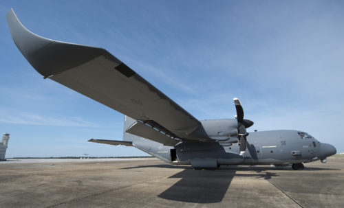 A modified MC-130J awaits its next mission at Eglin Air Force Base, Fla.  The aircraft has been fitted with vertical fins on each wing, called winglets.  The 413th Flight Test Squadron aircrew and engineers tested the modified aircraft over eight flights.  The goal of the tests was to collect data on possible fuel efficiency improvements and performance with the winglets and lift distribution control system installed.  (U.S. Air Force photo/Samuel King Jr.)