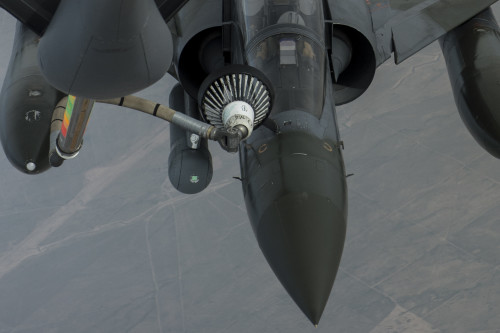 A French Mirage 2000D receives fuel from a U.S Air Force KC-135 Stratotanker over Iraq April 8, 2016. Coalition forces fly daily missions in support of Operation Inherent Resolve. OIR is the coalition intervention against the Islamic State of Iraq and the Levant. (U.S. Air Force photo by Staff Sgt. Corey Hook/Released)