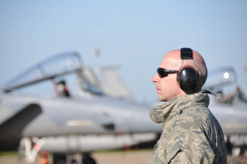 U.S. Air Force and Massachusetts Air National Guard Master Sgt. David Nye, 104th Fighter Wing flight chief, observes flightline operations as the F-15C/D Eagle aircraft prepare for the first of 2 launches, April 21, 2016.  Master Sgt. Nye is deployed as part of the 131st Expeditionary Fighter Squadron and is participation in the Royal Netherlands Air Force Frisian Flag 2016 exercise, Leeuwarden Air Base, Netherlands.