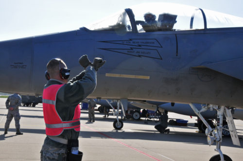 U.S. Air Force and Massachusetts Air National Guard weapons load chief signals the pilot of an F-15C Eagle to brake so the aircraft’s weapons can be armed during Frisian Flag 2016, Leeuwarden Air Base, Netherlands, April 21, 2016.  The exercise runs from April 11-22 and is comprised of more than 70 aircraft and several hundred personnel from the United States, Netherlands, Belgium, France, Finland, Poland, Norway, United Kingdom, Germany and Australia.
