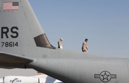 U.S. Air Force Technical Sergeant Gregory Flores (right), a loadmaster with the 37th Airlift Squadron (AS), and U.S. Air Force Staff Sergeant Ryan Gorby (left), a crew chief with the 86th Aircraft Maintenance Squadron (AMXS), walk across the tale end of their U.S. Air Force C-130J Hercules at the International Marrakech Airshow in Morocco on Apr. 27, 2016. TSgt Flores and SSgt Gorby are part of a six-man flight crew entrusted with transporting the aircraft to the airshow and showcasing the aircrafts capabilities to spectators. (DoD News photo by TSgt Brian Kimball)