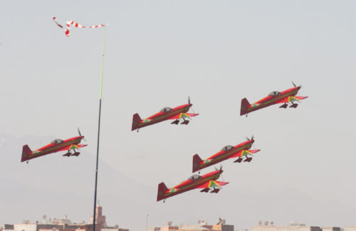 Pilots, with the Royal Moroccan Air Force Aerobatic Display Team, demonstrate the their aircrafts inflight capabilities during the International Marrakech Airshow in Morocco on Apr. 27, 2016. Several United States, independent and government owned aircraft were displayed at the expo in an effort to demonstrate their capabilities to a broad audience of individuals from approximately 54 other countries. (DoD News photo by TSgt Brian Kimball)