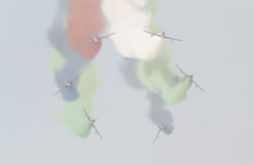 Pilots, with the United Arab Emirates Air Force Aerobatic Display Team, demonstrate the Al Fursan aircrafts inflight capabilities during the International Marrakech Airshow in Morocco on Apr. 27, 2016. Several United States, independent and government owned aircraft were displayed at the expo in an effort to demonstrate their capabilities to a broad audience of individuals from approximately 54 other countries. (DoD News photo by TSgt Brian Kimball)