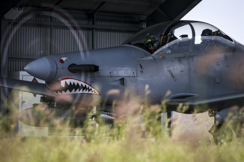 Flight Lieutenant (FLTLT) Col Burrows (front seat) and FLTLT Brian Williams prepare to taxi a No. 4 Squadron PC-9 to the runway of RAAF Base Townsville.[/caption]

[caption id=