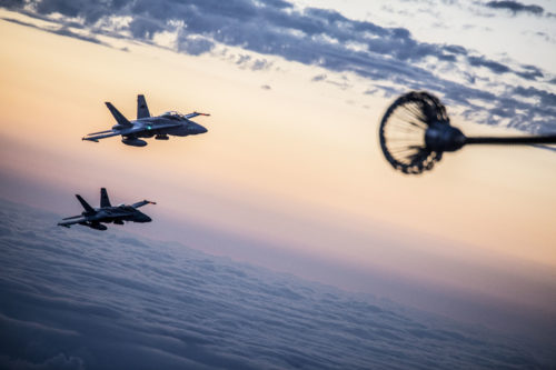 Marines with Marine Aerial Refueler Transport Squadron (VMGR) 152 and Marine All-Weather Fighter Attack Squadron (VMFA) 242 perform air to air refueling April 28, 2016. The units practiced both in the afternoon and at night to ensure maximum readiness in any scenario. (U.S. Marine Corps photo by Cpl. Nathan Wicks/Released)