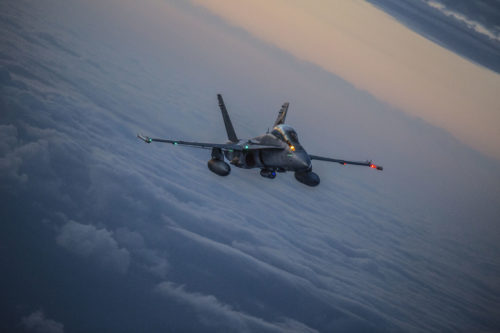 Marines with Marine Aerial Refueler Transport Squadron (VMGR) 152 and Marine All-Weather Fighter Attack Squadron (VMFA) 242 perform air to air refueling April 28, 2016. The units practiced both in the afternoon and at night to ensure maximum readiness in any scenario. (U.S. Marine Corps photo by Cpl. Nathan Wicks/Released)