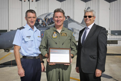 Officer Commanding Tactical Fighter Systems Program Office, Group Captain David Langlois, Officer Commanding Number 78 Wing, Group Captain Terry van Haren, DSM and BAE Systems Director Steve Dury with the certificate of 100,000 flying hours. *** Local Caption *** The Royal Australian Air Force has reached a milestone of 100,000 Hr flight time on the Hawk 127 Fleet which is a significant milestone in the life cycle of a fast jet system.