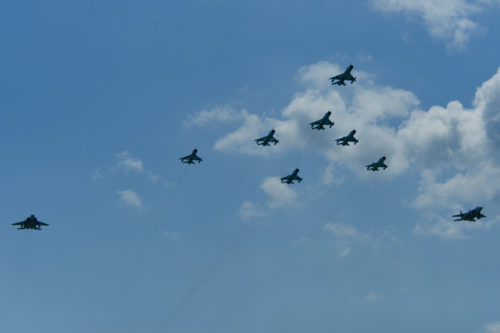 A flight formation of Romanian air force MiG-21 LanceR aircraft and U.S. Air Force F-15C Eagle fighter aircraft fly during the RoAF's 71st Air Base's air show and open house at Campia Turzii, Romania, July 23, 2016.  The aviation demonstration took place during the middle of the U.S. Air Force's 194th Expeditionary Fighter Squadron's six-month long theater security package deployment to Europe in support of Operation Atlantic Resolve, which aims to bolster the U.S.'s continued commitment to the collective security of NATO and dedication to the enduring peace and stability in the region. The unit, comprised of more than 200 CANG Airmen from the 144th Fighter Wing at Fresno ANG Base, California, as well as U.S. Air Force Airmen from the 52nd Fighter Wing at Spangdahlem Air Base, Germany, piloted, maintained and supported the deployment of 12 F-15Cs Eagle fighter aircraft throughout nations like Romania, Iceland, the United Kingdom, the Netherlands, Estonia and among others. The F-15Cs took to the skies alongside the 71st AB's MiG-21 fighter aircraft and Puma helicopters for both the airshow, the second engagement of its kind at Campia Turzii under Operation Atlantic Resolve, and the bilateral flight training, also known as Dacian Eagle 2016. (U.S. Air Force photo by Staff Sgt. Joe W. McFadden/Released)