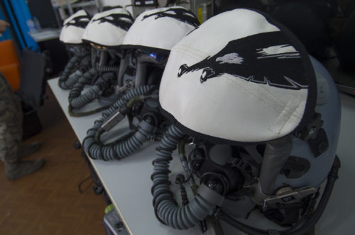 A collection of helmets belonging to California Air National Guard F-15C Eagle fighter aircraft pilots remain on a table at the 194th Expeditionary Fighter Squadron’s flight operations room at Graf Ignatievo, Bulgaria, Sept. 8, 2016. Four of the squadron’s F-15Cs will conduct joint NATO air policing missions with the Bulgarian air force to police the host nation’s sovereign airspace Sept. 9-16, 2016. The squadron forward deployed to Graf Ignatievo from Campia Turzii, Romania, where they serve on a theater security package deployment to Europe as a part of Operation Atlantic Resolve. (U.S. Air Force photo by Staff Sgt. Joe W. McFadden)