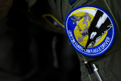 A 194th Expeditionary Fighter Squadron patch remains affixed to the flightsuit of a California Air National Guard F-15C Eagle fighter aircraft pilot inside the squadron’s flight operations room at Graf Ignatievo, Bulgaria, Sept. 8, 2016. Four of the squadron’s F-15Cs will conduct joint NATO air policing missions with the Bulgarian air force to police the host nation’s sovereign airspace. The squadron forward deployed to Graf Ignatievo from Campia Turzii, Romania, where they serve on a theater security package deployment to Europe as a part of Operation Atlantic Resolve. (U.S. Air Force photo by Staff Sgt. Joe W. McFadden)