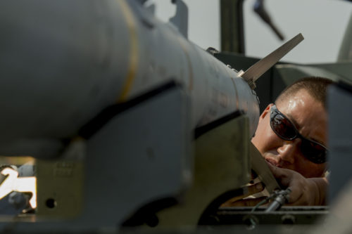 California Air National Guard Staff Sgt. Moau Koau, a 194th Expeditionary Fighter Squadron weapons craftsman, affixes wings on an AIM-120 advanced medium-range air-to-air missile on the flightline at Graf Ignatievo, Bulgaria, Sept. 8, 2016. Four of the squadron’s F-15C Eagle fighter aircraft will conduct joint NATO air policing missions with the Bulgarian air force to police the host nation’s sovereign airspace Sept. 9-16, 2016. The squadron forward deployed to Graf Ignatievo from Campia Turzii, Romania, where they serve on a theater security package deployment to Europe as a part of Operation Atlantic Resolve. (U.S. Air Force photo by Staff Sgt. Joe W. McFadden)