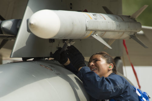 California Air National Guard Master Sgt. Audra Jimenez, a 194th Expeditionary Fighter Squadron weapons craftsman, affixes an AIM-120 advanced medium-range air-to-air missile onto an F-15C Eagle fighter aircraft on the flightline at Graf Ignatievo, Bulgaria, Sept. 8, 2016. Four of the squadron’s F-15Cs will conduct joint NATO air policing missions with the Bulgarian air force to police the host nation’s sovereign airspace Sept. 9-16, 2016. The squadron forward deployed to Graf Ignatievo from Campia Turzii, Romania, where they serve on a theater security package deployment to Europe as a part of Operation Atlantic Resolve. (U.S. Air Force photo by Staff Sgt. Joe W. McFadden)