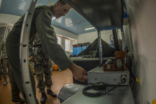 California Air National Guard Lt. Col. Matthew Ohman, a 194th Expeditionary Fighter Squadron F-15C Eagle pilot, tests a radio warning system out of their squadron’s flight operations room during joint NATO air policing at Graf Ignatievo, Bulgaria, Sept. 9, 2016. Four California and Massachusetts ANGs’ F-15Cs and approximately 75 Airmen from the 194th EFS deployed to Graf Ignatievo, Bulgaria, and will stand ready as interceptors, prepared to quickly react to any violations and infringements for policing of Bulgarian airspace Sept. 9-16, 2016. The squadron forward deployed to Graf Ignatievo from Campia Turzii, Romania, where they serve on a theater security package deployment to Europe as a part of Operation Atlantic Resolve.  (U.S. Air Force photo by Staff Sgt. Joe W. McFadden/Released)