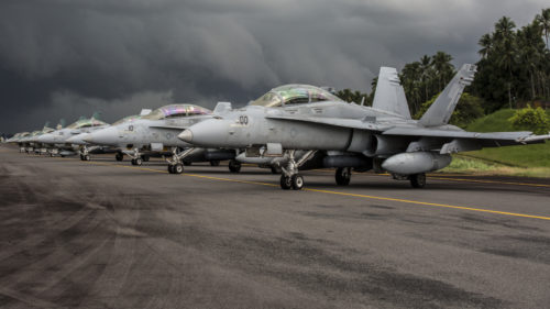 U.S. Marine Corps F/A-18D Hornets with Marine All-Weather Fighter Attack Squadron (VMFA(AW)) 225 and Indonesian F-16 Fighting Falcons sit on the flight line during exercise Cope West 17 at Sam Ratulangi International Airport, Indonesia, Nov. 10, 2016. This fighter-focused, bilateral exercise between the U.S. Marine Corps and Indonesian Air Force is designed to enhance the readiness of combined interoperability between the two nations. Both the U.S. F/A-18D Hornets and Indonesian F-16 Fighting Falcons bring unique capabilities affording the associated nations the opportunity to learn and understand each other’s skills, preparing them for real world contingencies and further strengthening their relationship. (U.S. Marine Corps photo by Cpl. Aaron Henson)