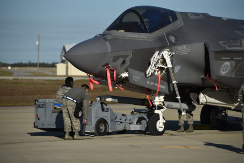 A U.S. Air Force weapons load crew assigned to the 33rd Aircraft Maintenance Squadron loads a live AIM-120 advanced medium-range air-to-air missiles (AMRAAM) into an F-35A January 31, 2017, at Eglin Air Force Base, Florida. The 33rd Fighter Wing loaded and shot the first air-to-air missiles from an F-35A during a weapons system evaluation that took place at Tyndall Air Force Base later the same day. Carrying air-to-air missiles makes the F-35 a more versatile option for combatant commanders by securing the aircrafts survivability, in turn increasing likeliness of mission success.  (U.S. Air Force photo by Staff Sgt. Peter Thompson)