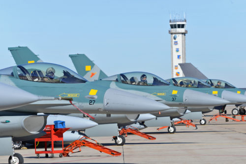 U.S. Air Force pilots assigned as Ferry Cell 5 prepare their Indonesian F-16 Fighting Falcon aircraft prior to departure on March 14 from Hill Air Force Base, Utah.  (U.S. Air Force Photo by Alex R. Lloyd)